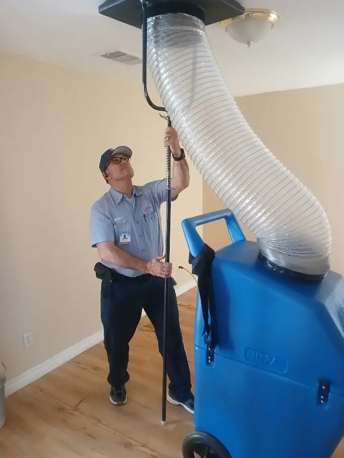 HVAC Installation technician using HEPA equipment in Cheval